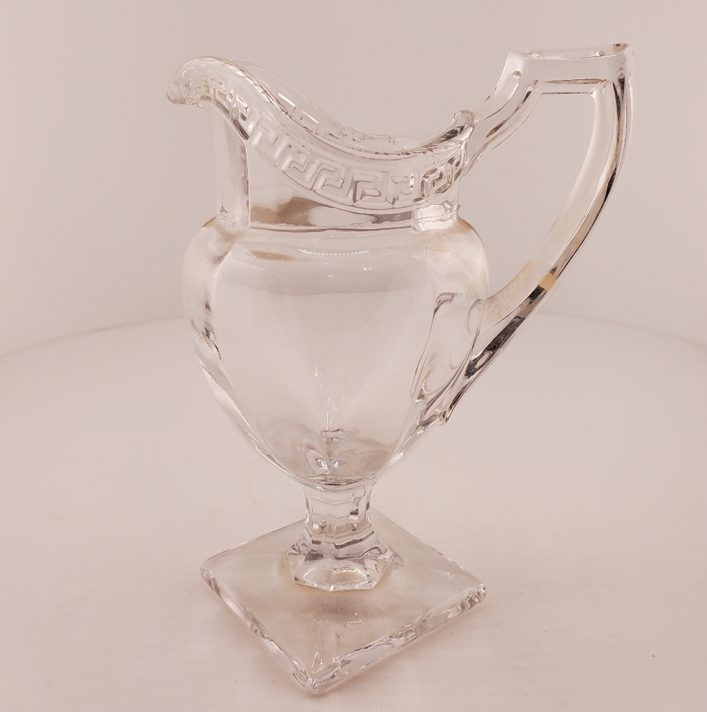 US Glass Greek Key Footed Pitcher